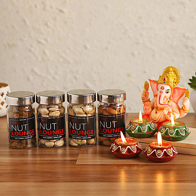 Buy Send Blissful Ganesha Idol With Dry Fruits Diyas Online FNP