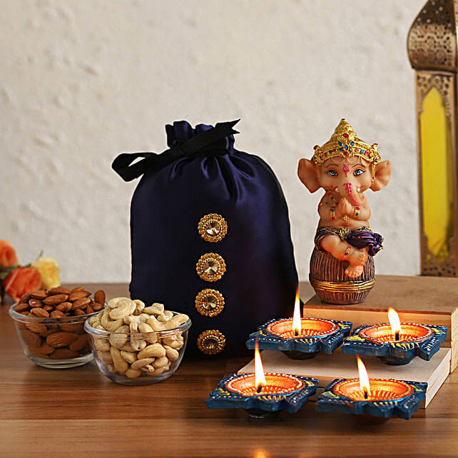 Buy Send Sitting Ganesha Idol With Diyas Dry Fruits Potli Online FNP