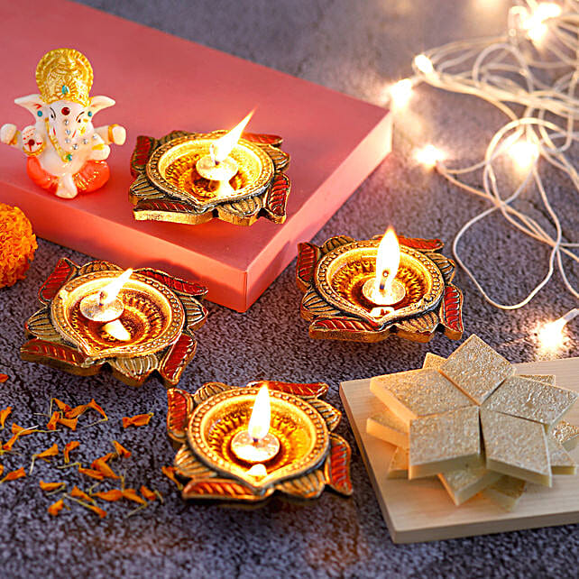 Buy Send 4 Swastik Diyas Ganesha Idol With Kaju Katli Online FNP