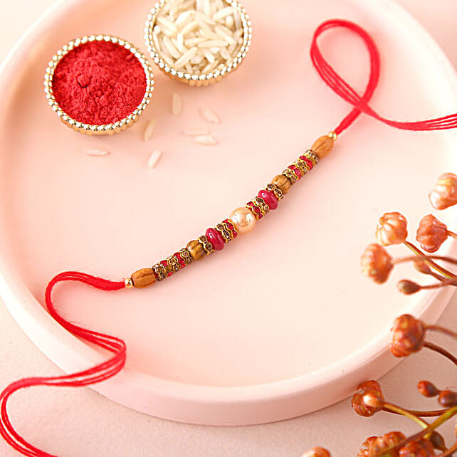 Buy Send Sneh Soothing Pearl Rakhi Online Fnp