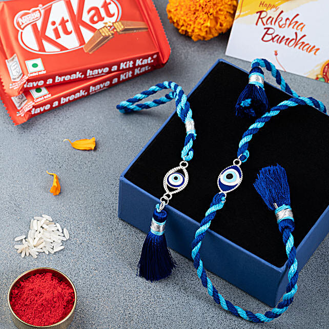 Buy Send Silver Evil Eye Bhaiya Bhabhi Rakhi N Chocolate Combo Online Fnp