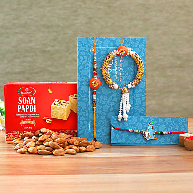 Lumba Rakhi Set And Bal Krishna Rakhi With Almonds And Soanpapdi Usa