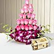 Combo of a cane Basket arrangement of 20 pink roses and 6 purple orchids with 16 pieces of ferrero rocher chocolates