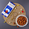Sneh Yellow Rakhi Set With Lindt Chocolates & Almonds