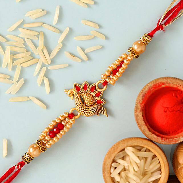 Lovely Red Peacock Rakhi australia | Gift Lovely Red Peacock Rakhi- FNP