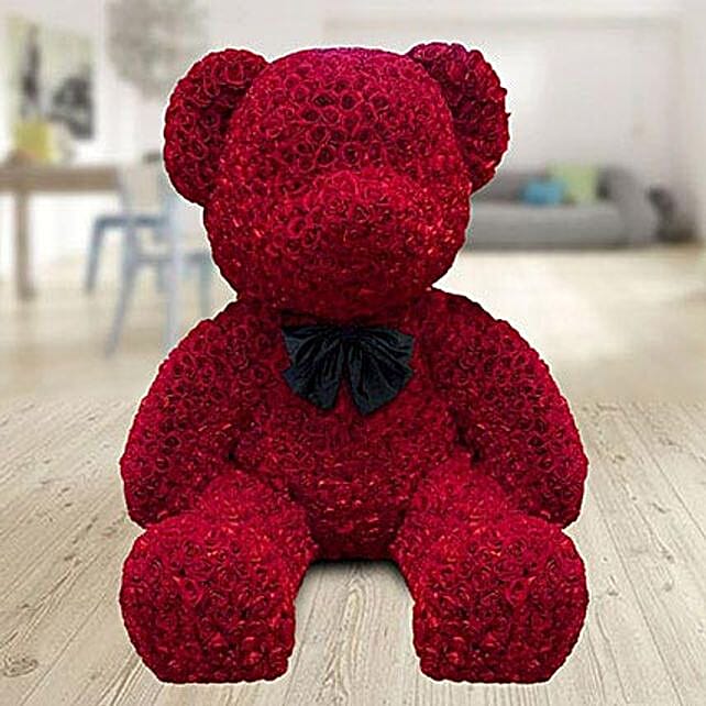 a teddy bear made of roses