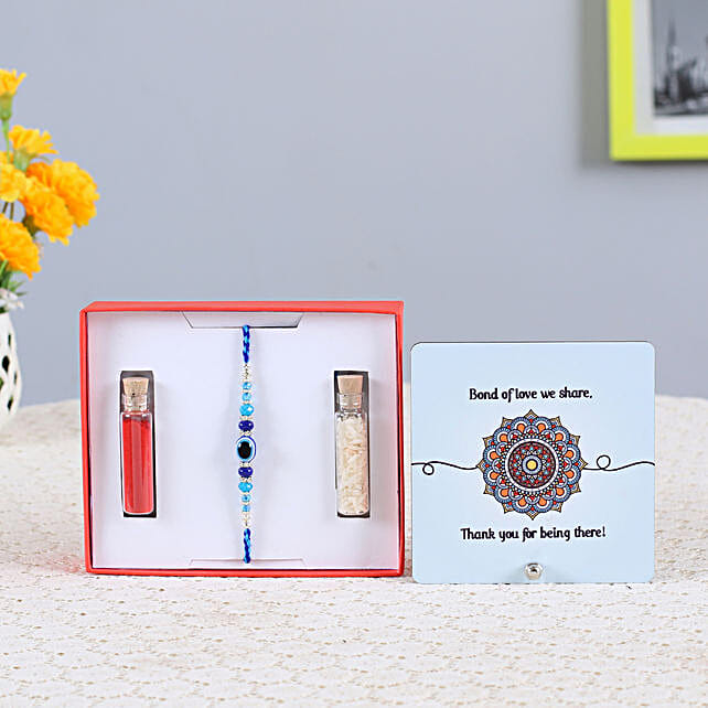 Buy/Send Evil Eye Rakhi & Table Top Combo Online FNP