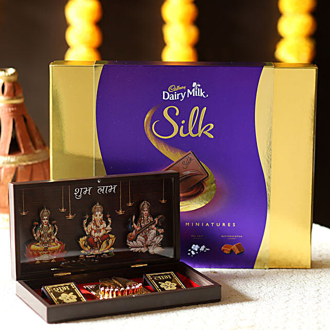 Buy/Send Diwali Pooja Box & Dairy Milk Miniatures Online FNP