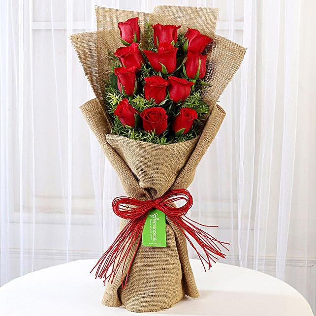 pics Red Roses Wrapped In Money buy send 12 red roses jute wrapped bouquet online ferns n petals