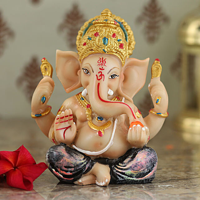 Buy/Send Elegant Lord Ganesha Idol In Blue Dhoti Online- FNP