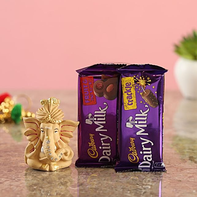 Buy/Send Cadbury Delights & Beige Ganesha Idol Online- FNP