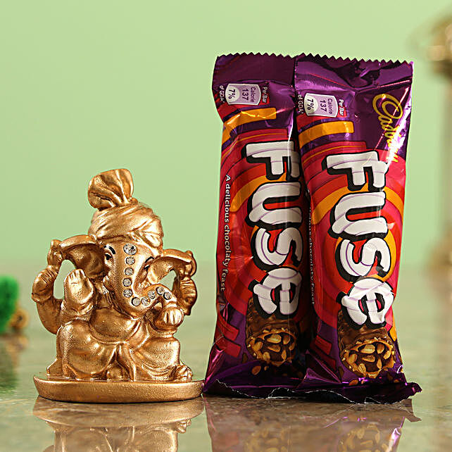 Buy/Send Cadbury Fuse Chocolate Bars & Golden Ganesha Idol Combo Online- FNP