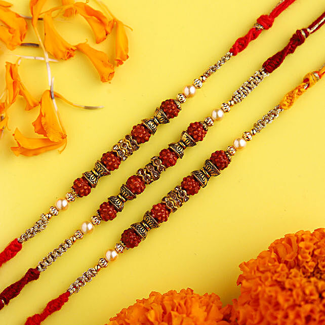 Raksha bandhan Gift for your Brother,Color Vary and Multi Design. Set of Three Rudraksh with 4 Stone Ring with yellow n red Thread
