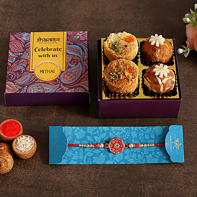 Buy/Send Meenakari Rakhi With Milk Cake & Besan Ladoo Online- FNP