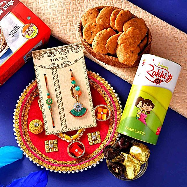 Buy Send Bhaiya Bhabhi Rakhis N Sweet And Savoury Treats Online Fnp