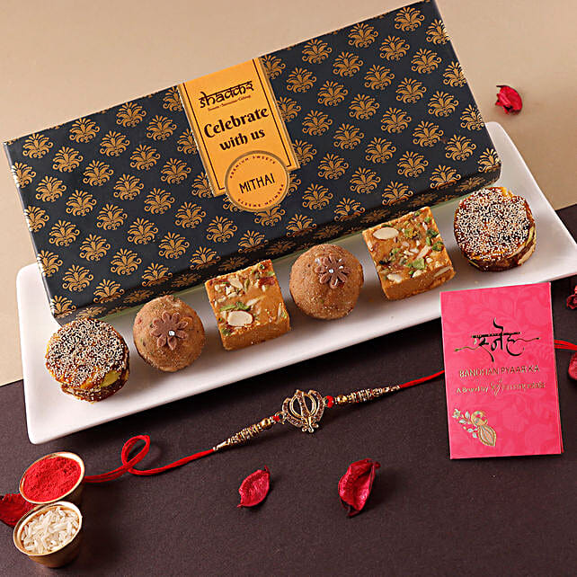 Buy Send Shakkar Sneh Traditional Look Onkar Rakhi Assorted Sweets Online Fnp