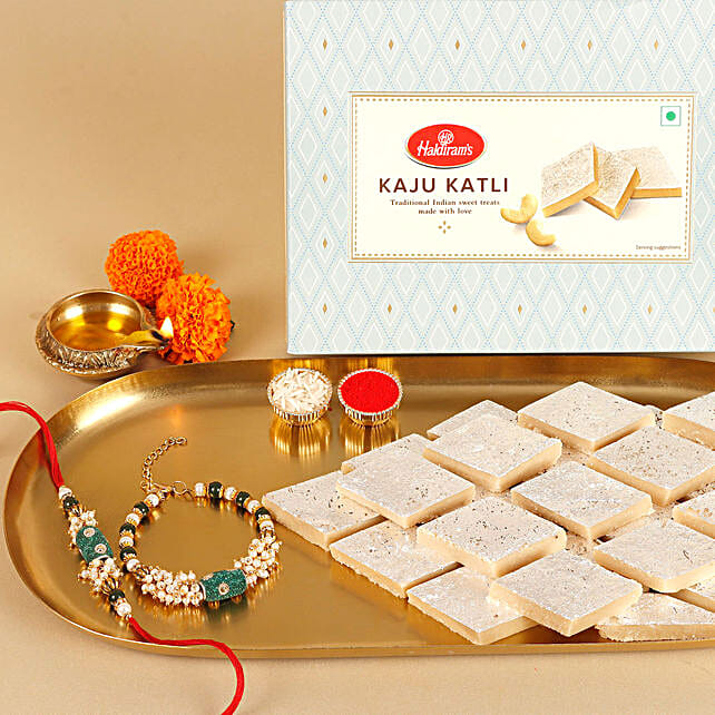 Buy/Send Sneh Pearl Bhaiya Bhabhi Rakhi Set N Haldiram Kaju Katli ...