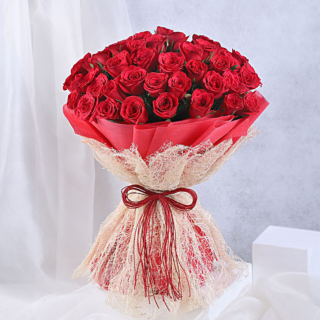 Buy/Send Vivid 50 Red Roses Bouquet Online- FNP
