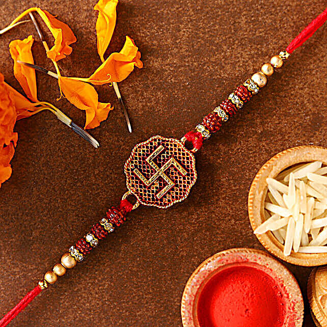 Buysend Sneh Golden Swastik Beaded Rakhi Online Fnp