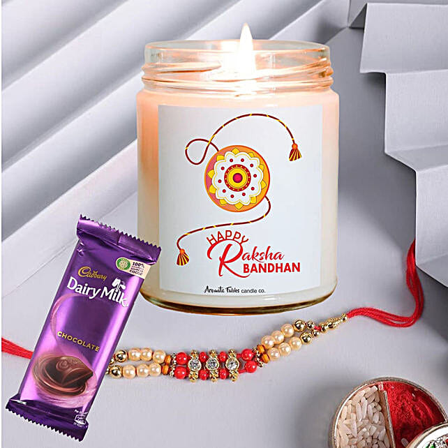 Buy/Send Traditional Rakhi With Rose Candle & Chocolate Online FNP