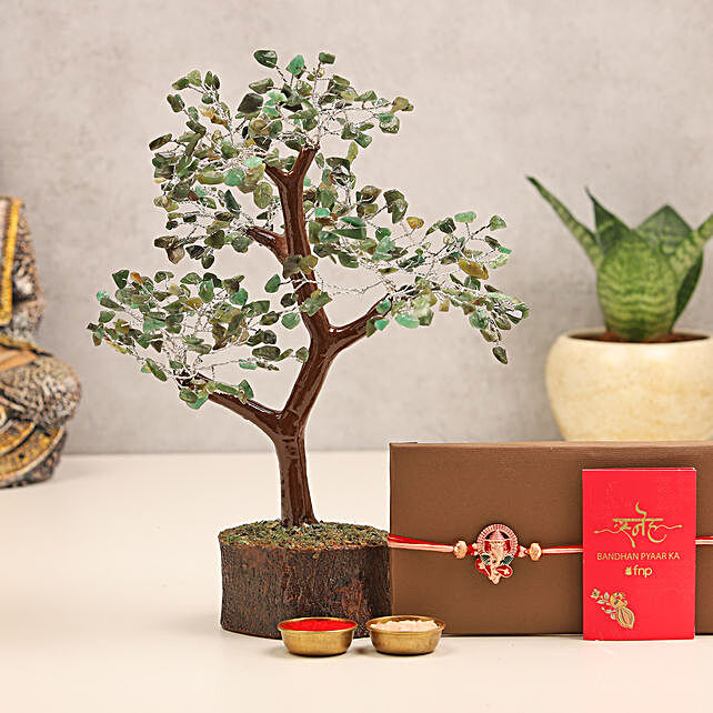 Buy/Send Sneh Devotional Ganesha Rakhi with Gemstone Wish Tree Online- FNP