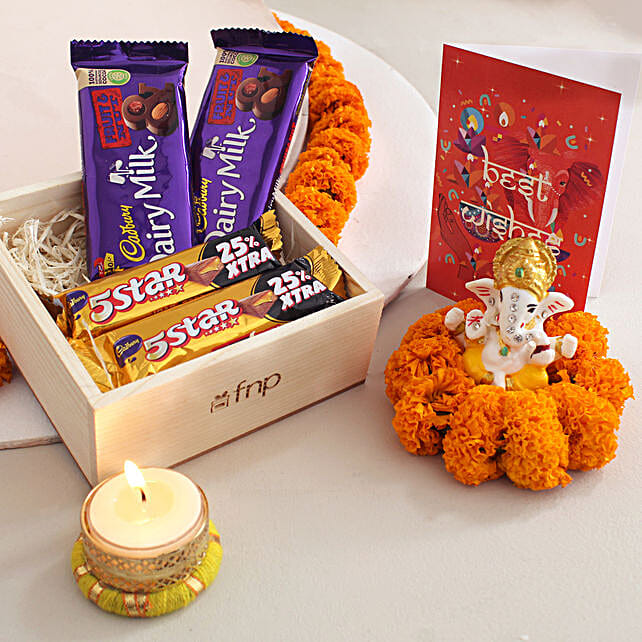 Cadbury Chocolates With Ganesha Idol N Candle Holder qatar Gift
