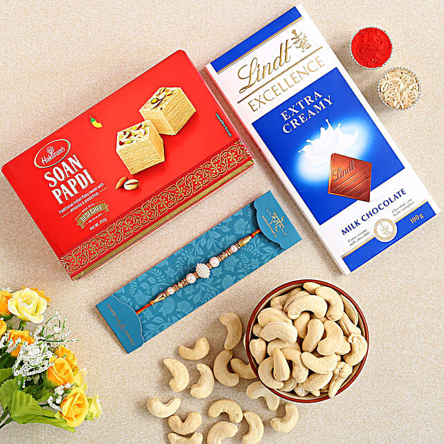 White Pearl Rakhi And Soan Papdi Hamper qatar Gift White Pearl Rakhi