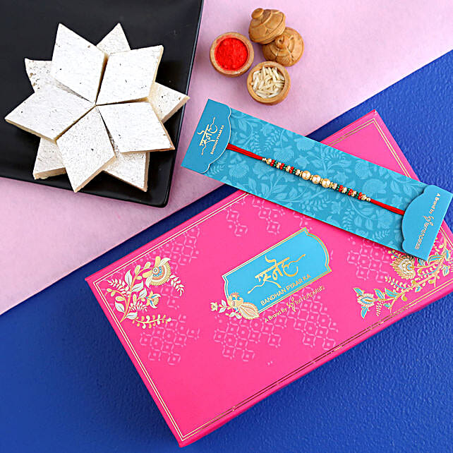 Traditional Pearl Studded Mauli Rakhi With 250Gms Kaju Katli qatar ...