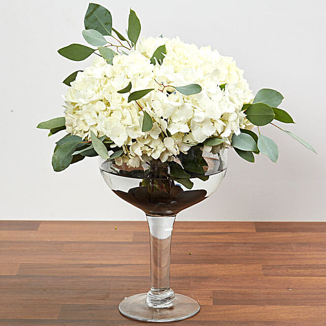 Hydrangeas In Clear Wine Glass Vase In Uae Gift Hydrangeas In