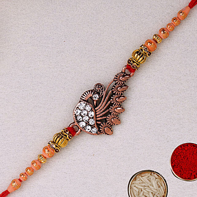 Elegant Golden Peacock Rakhi uae | Gift Elegant Golden Peacock Rakhi- FNP