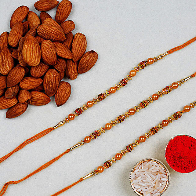 Golden Red Thread Rakhi With Almonds 100 Gms Uae 