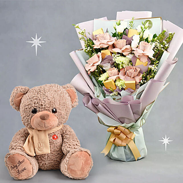 Mesmerising Flowers and Chocolates Bouquet with Teddy bear uae Gift