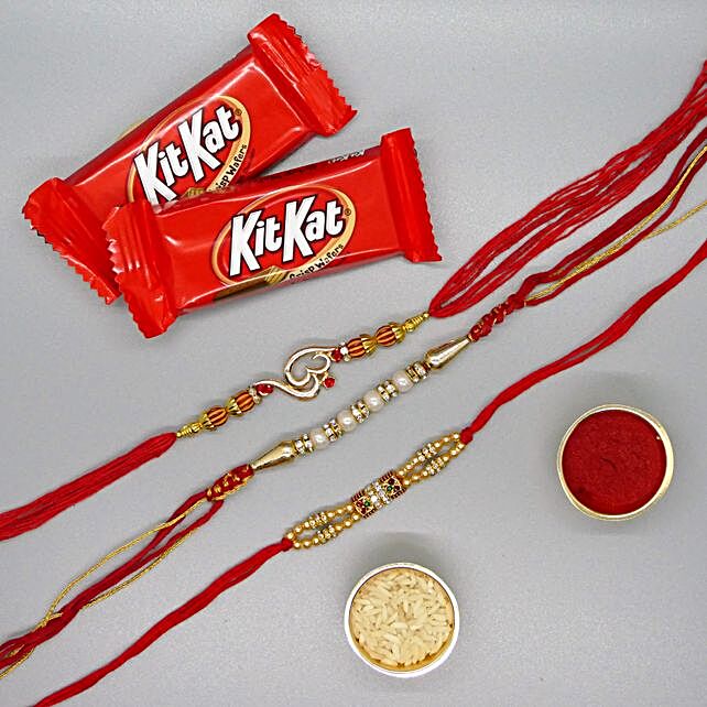 Three Sparkling Rakhis And Kit Kat Combo Usa T Three Sparkling Rakhis And Kit Kat Combo Fnp