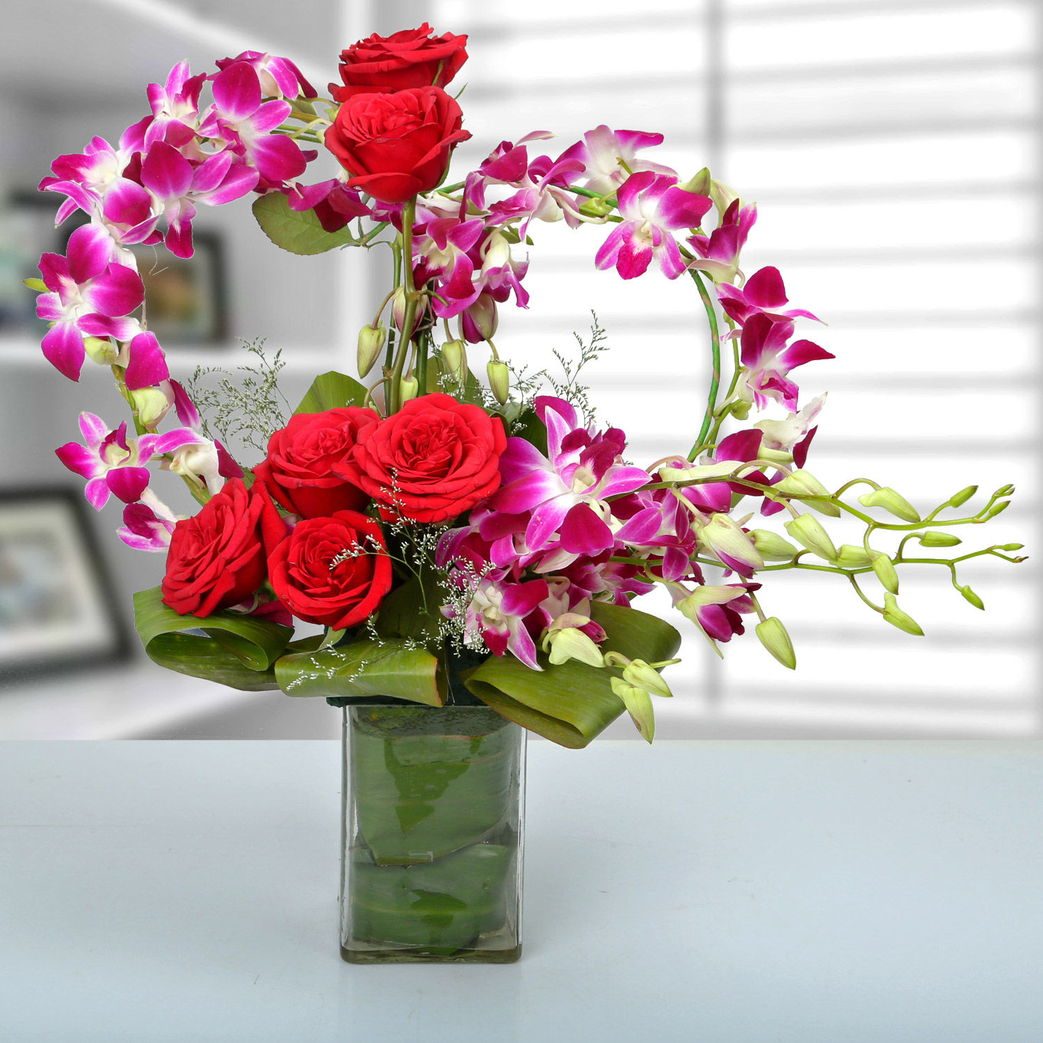 Buy/Send Rose and Orchid Arrangement Online Ferns N Petals