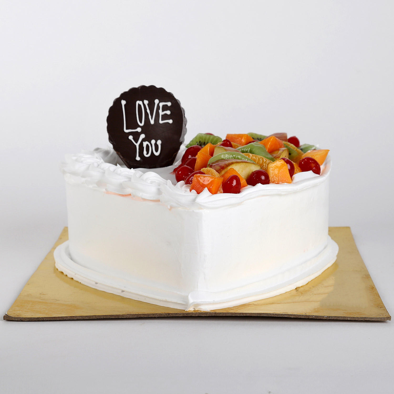 Heart Shaped Vanilla Fruit Cake Half Kg Gift Creamy fruit heart shape cake online Ferns N