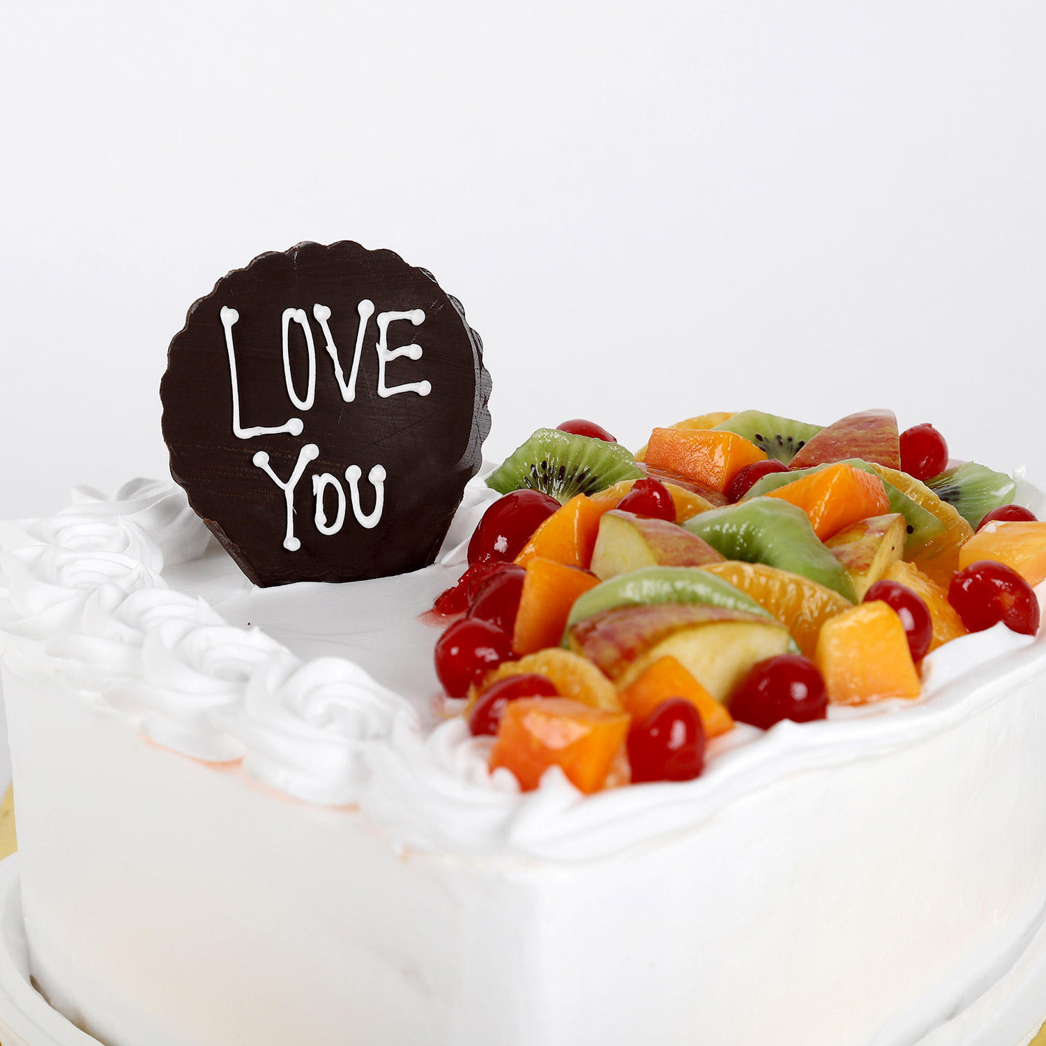 Heart Shaped Vanilla Fruit Cake Half Kg Gift Creamy fruit heart shape cake online Ferns N