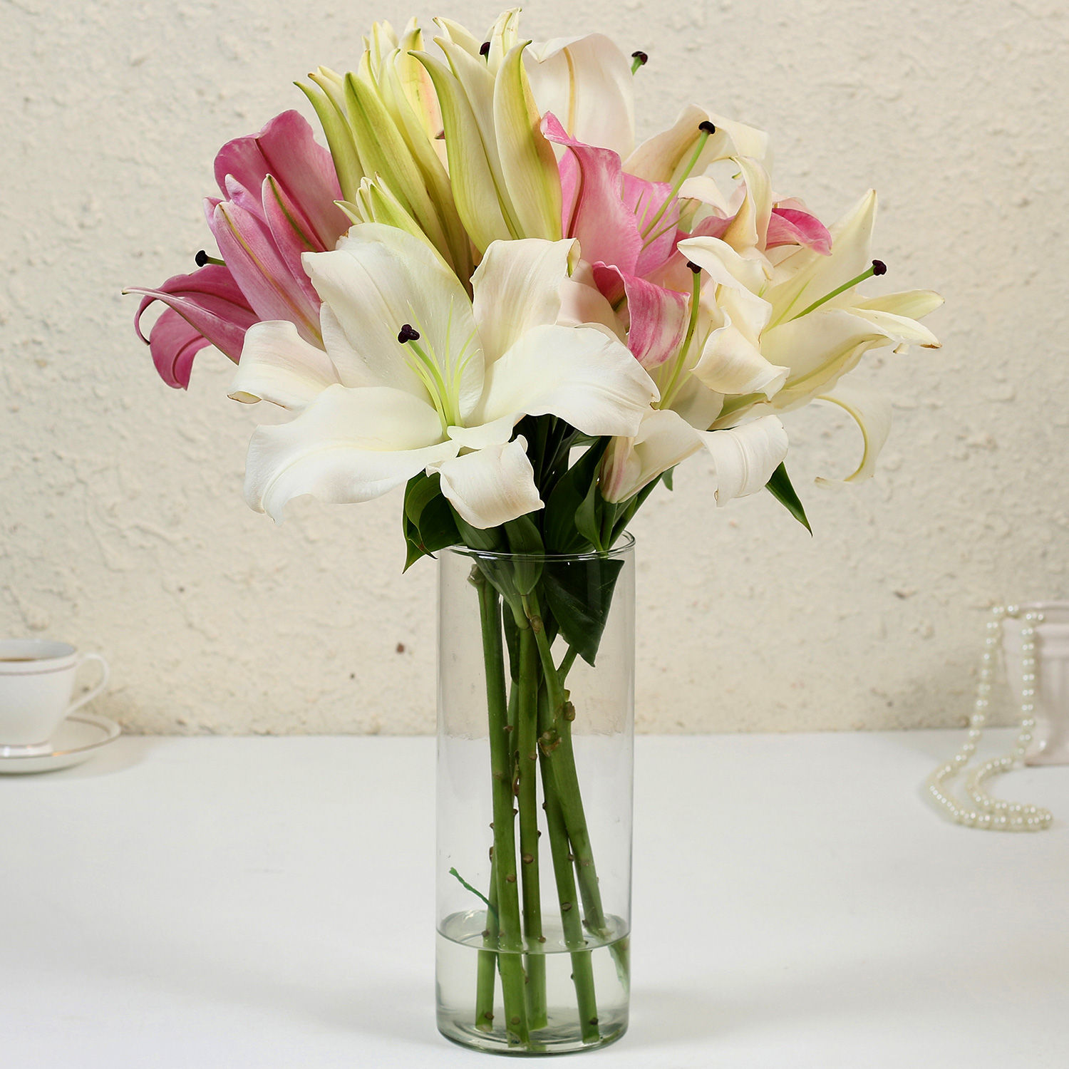 Buy/Send Pink & White Oriental Lilies in Glass Vase Online- Ferns N Petals