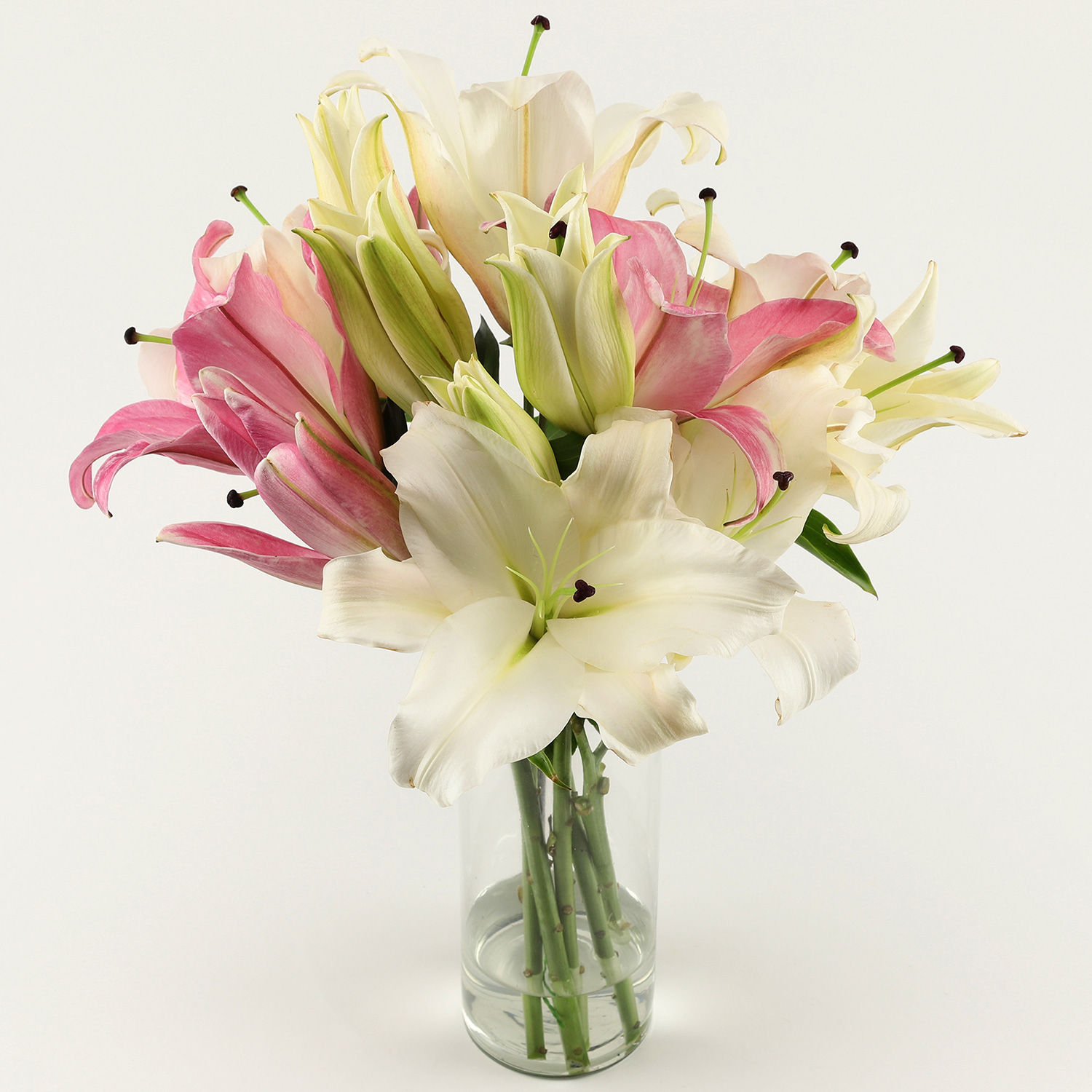 Buy/Send Pink & White Oriental Lilies in Glass Vase Online- Ferns N Petals