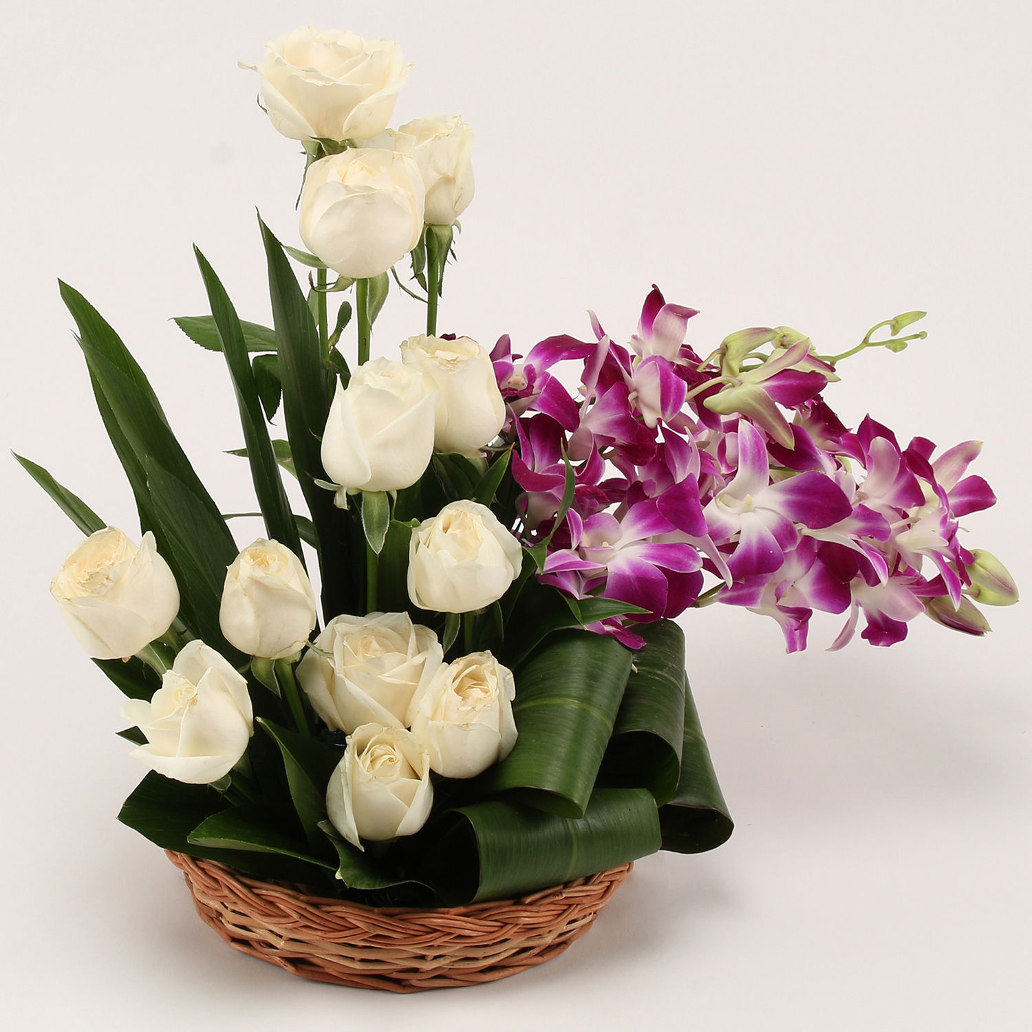 Buy/Send White Roses & Orchids Arrangement Online- Ferns N Petals