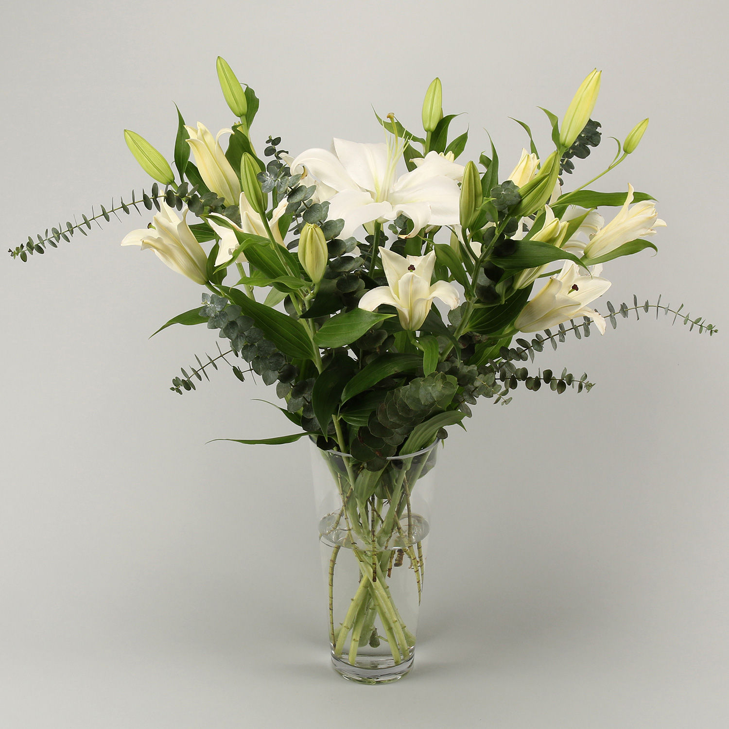 Buy/Send White Oriental Lilies In Vase Online- Ferns N Petals